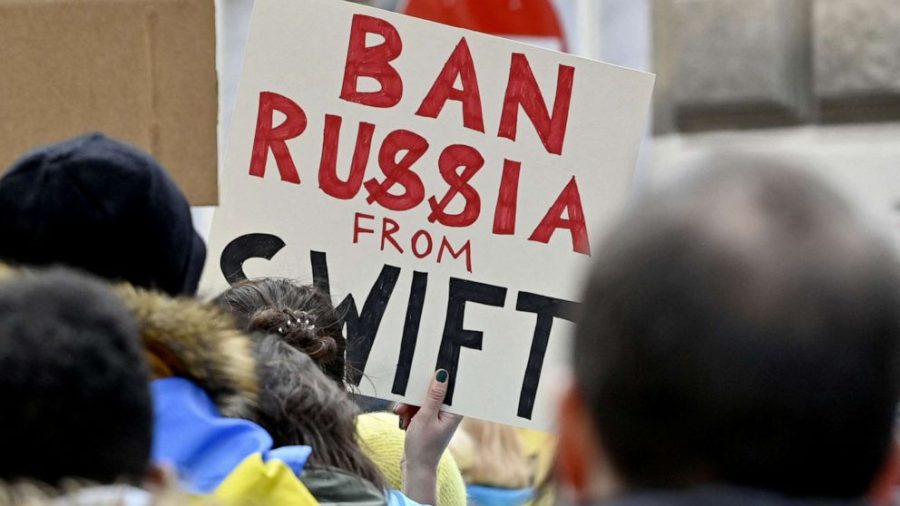 In+a+protest+against+the+Russian+attacks+on+Ukraine%2C+some+people+demand+that+Russia+be+taken+out+of+the+SWIFT+network.