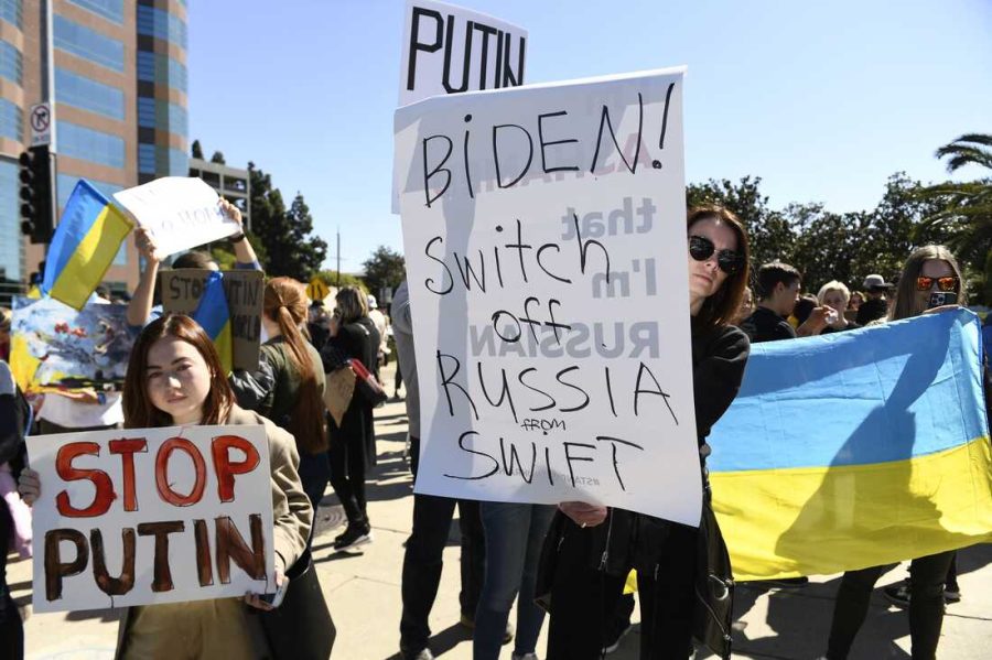 Demonstrators protest in support of Ukraine, in Los Angeles, on February 24, 2022. - Russian President Vladimir Putin launched a full-scale invasion of Ukraine on Thursday, unleashing air strikes and ordering ground troops across the border in fighting that Ukrainian authorities said left dozens of people dead. 
