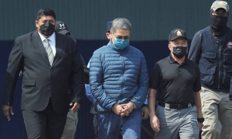 Former Honduran President Juan Orlando Hernandez at an airport before he was extradited to the U.S.