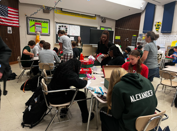 FCA students pack Christmas toy boxes for kids in need