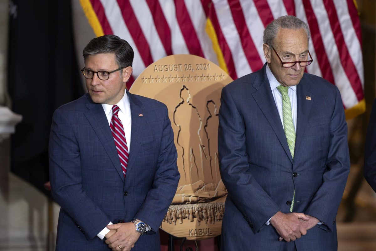 Speaker of the House Mike Johnson (left) and Senate Majority Leader Chuck Schumer (right)