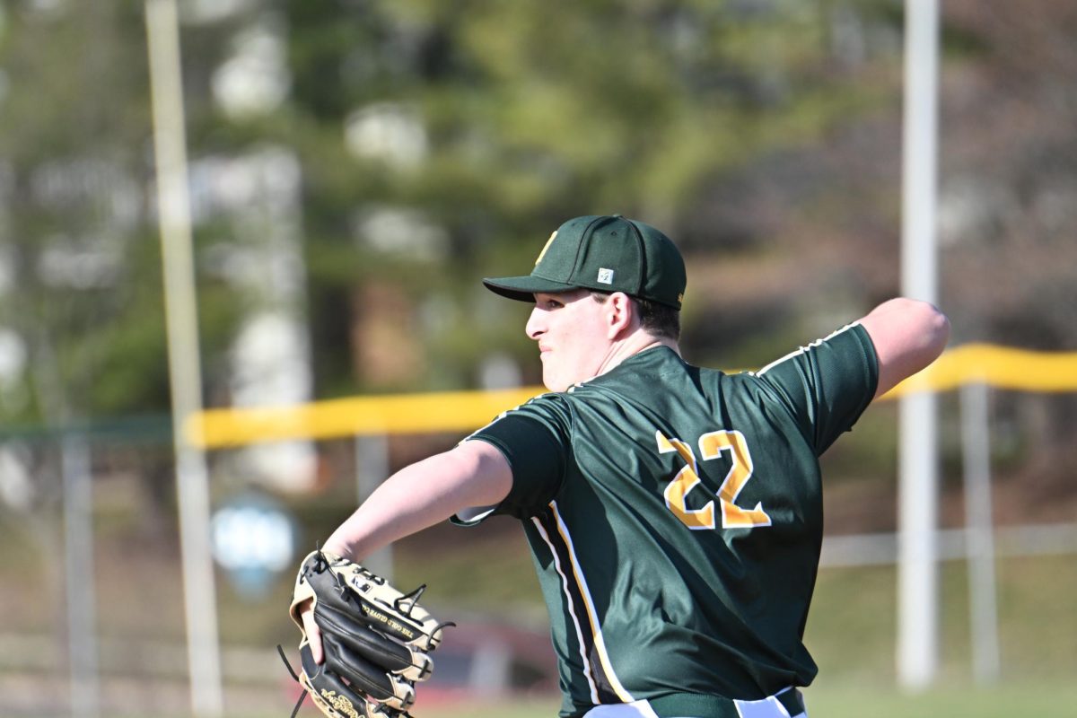 Here is a photo of Joe Stack as he pitches. 

