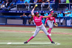 Courtney Wyche pitching for her Bravas de Leon international team