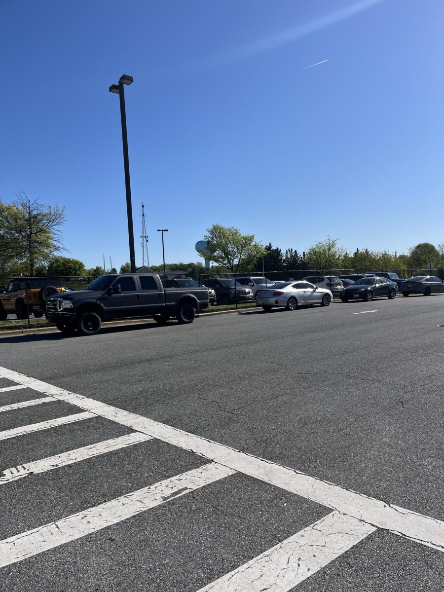 Damascus parking lot; dealing with overflow and spot stealing.