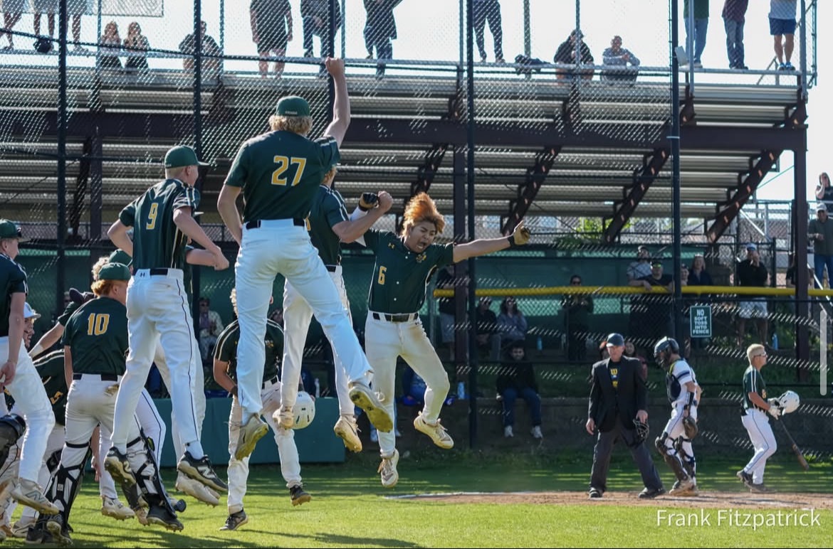 Boys' baseball celebrates a win.